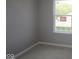 Bedroom with carpet and a window at 4075 Persian St, Greenwood, IN 46143