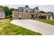 Charming two-story home with a three-car garage and spacious driveway at 4075 Persian St, Greenwood, IN 46143