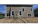 Newly constructed home featuring brown siding, white trim, and energy-efficient windows at 4075 Persian St, Greenwood, IN 46143