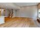 Spacious living area featuring hardwood floors, bright light, and a staircase at 4075 Persian St, Greenwood, IN 46143