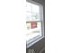 Window showing an exterior view of a new home under construction at 4075 Persian St, Greenwood, IN 46143