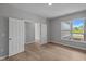 Spacious bedroom with double doors and large window offering plenty of natural light at 4076 Berry Chase Blvd, Greenwood, IN 46143