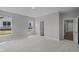 Spacious bedroom features neutral walls, plush carpet, and an en-suite bathroom at 4076 Berry Chase Blvd, Greenwood, IN 46143