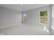 Spacious bedroom with large windows offering views of the neighborhood at 4076 Berry Chase Blvd, Greenwood, IN 46143