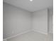 A simple bedroom with carpeted floors and light gray walls at 4076 Berry Chase Blvd, Greenwood, IN 46143