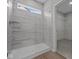 Modern bathroom featuring tile shower and closet at 4076 Berry Chase Blvd, Greenwood, IN 46143
