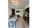 Open kitchen with modern appliances and a dining area at 4718 Tempe Ct, Indianapolis, IN 46241