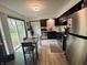 This open-concept kitchen has a nice eating area and a sliding glass door at 4718 Tempe Ct, Indianapolis, IN 46241