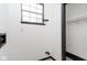 Bright laundry room features a window for natural light and modern connections at 4718 Tempe Ct, Indianapolis, IN 46241
