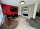 Modern living room with a fireplace, couch, and wood floors at 4718 Tempe Ct, Indianapolis, IN 46241
