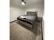 This bedroom features neutral walls, carpeted floors, and natural light at 4718 Tempe Ct, Indianapolis, IN 46241