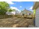 Backyard showcasing a wood deck, lawn and fence at 4725 Boulevard Pl, Indianapolis, IN 46208
