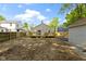 Spacious backyard with a wood deck, perfect for enjoying the outdoors at 4725 Boulevard Pl, Indianapolis, IN 46208