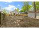 Backyard featuring a wood deck and lawn at 4725 Boulevard Pl, Indianapolis, IN 46208