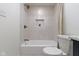 Updated bathroom showcasing a tiled shower/tub combo with a recessed niche for toiletries at 4725 Boulevard Pl, Indianapolis, IN 46208