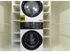 A stackable washer and dryer setup is cleverly integrated into closet shelving for convenience at 4725 Boulevard Pl, Indianapolis, IN 46208