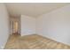 Spacious bedroom with neutral carpet and walls, with a window overlooking the yard at 4752 Chip Shot Ln, Indianapolis, IN 46235