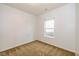 A bright bedroom featuring neutral carpet and a window providing natural light at 4752 Chip Shot Ln, Indianapolis, IN 46235