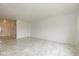 Bright and airy living area with neutral walls, marble flooring, and ample space for furniture at 4752 Chip Shot Ln, Indianapolis, IN 46235