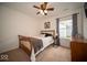 Comfortable bedroom with neutral walls and hardwood floors at 505 Shallowroot Ln, Sheridan, IN 46069