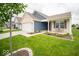Charming single-story home with brick facade, attached garage, and manicured lawn at 505 Shallowroot Ln, Sheridan, IN 46069