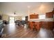 Open-concept living space with hardwood floors, and a combined dining and living area at 505 Shallowroot Ln, Sheridan, IN 46069