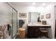 Bathroom featuring a glass door shower and generous counter space with a vanity at 509 Tulip Tree Dr, Lapel, IN 46051