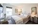 Cozy bedroom with comfortable bed, vintage decor, and plenty of natural light from the window at 509 Tulip Tree Dr, Lapel, IN 46051