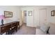 Bright and tidy bedroom with desk, closet, and comfortable sofa at 509 Tulip Tree Dr, Lapel, IN 46051