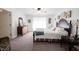 Spacious bedroom with traditional furnishings, a ceiling fan, and natural light at 509 Tulip Tree Dr, Lapel, IN 46051