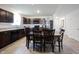 Well-equipped kitchen features sleek appliances, ample cabinet space, and a cozy dining area at 509 Tulip Tree Dr, Lapel, IN 46051