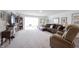Comfortable living room with a fireplace, plush seating, and a cozy atmosphere at 509 Tulip Tree Dr, Lapel, IN 46051