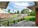 Backyard featuring a wood bench and partial view of the yard at 5101 Dickson Rd, Indianapolis, IN 46226