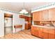 Traditional kitchen featuring wood cabinets, laminate countertops, and eat in breakfast nook at 5101 Dickson Rd, Indianapolis, IN 46226