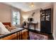 Bedroom with a modern desk, stylish cabinet, and comfortable daybed at 5241 Guilford Ave, Indianapolis, IN 46220