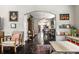 Open-concept living space featuring a cozy seating area, dining room, and kitchen at 5241 Guilford Ave, Indianapolis, IN 46220