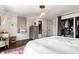 Bright main bedroom with generous closet space, wood floors, and stylish decor at 5241 Guilford Ave, Indianapolis, IN 46220