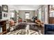 Inviting playroom area featuring an abundance of toys, a neutral chair, and an upright piano at 5241 Guilford Ave, Indianapolis, IN 46220