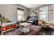 Charming playroom with lots of toys, a piano, and natural light at 5241 Guilford Ave, Indianapolis, IN 46220