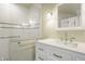 This modern bathroom features a glass shower, sink with vanity and updated fixtures at 5800 Lawrence Dr, Indianapolis, IN 46226