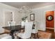 Dining room featuring a decorative ceiling and doorway to another room at 5800 Lawrence Dr, Indianapolis, IN 46226