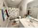 Themed bathroom featuring decorative shower curtain and decor creating a fun and inviting space at 6309 Harvey Dr, Plainfield, IN 46168