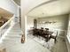 Dining room and stairway with modern decor and natural light at 6309 Harvey Dr, Plainfield, IN 46168