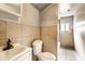 Neutral bathroom features tile and a built-in vanity at 647 Coffey St, Indianapolis, IN 46221