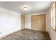Bright bedroom features wood-look flooring and natural light at 647 Coffey St, Indianapolis, IN 46221
