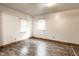 A cozy bedroom with natural light and laminate flooring, perfect for relaxation at 647 Coffey St, Indianapolis, IN 46221