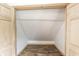 Walk in closet features wood-look flooring and ample storage at 647 Coffey St, Indianapolis, IN 46221