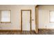 A white door adds a touch of elegance to the living room at 647 Coffey St, Indianapolis, IN 46221