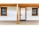 Covered front porch offers a cozy spot to relax and enjoy the outdoors at 647 Coffey St, Indianapolis, IN 46221