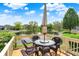 Outdoor deck area overlooking a picturesque pond, perfect for relaxing and entertaining guests at 6505 Miramar Ct, Indianapolis, IN 46250